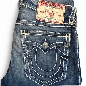 True Religion denim jeans with red label and blue wash